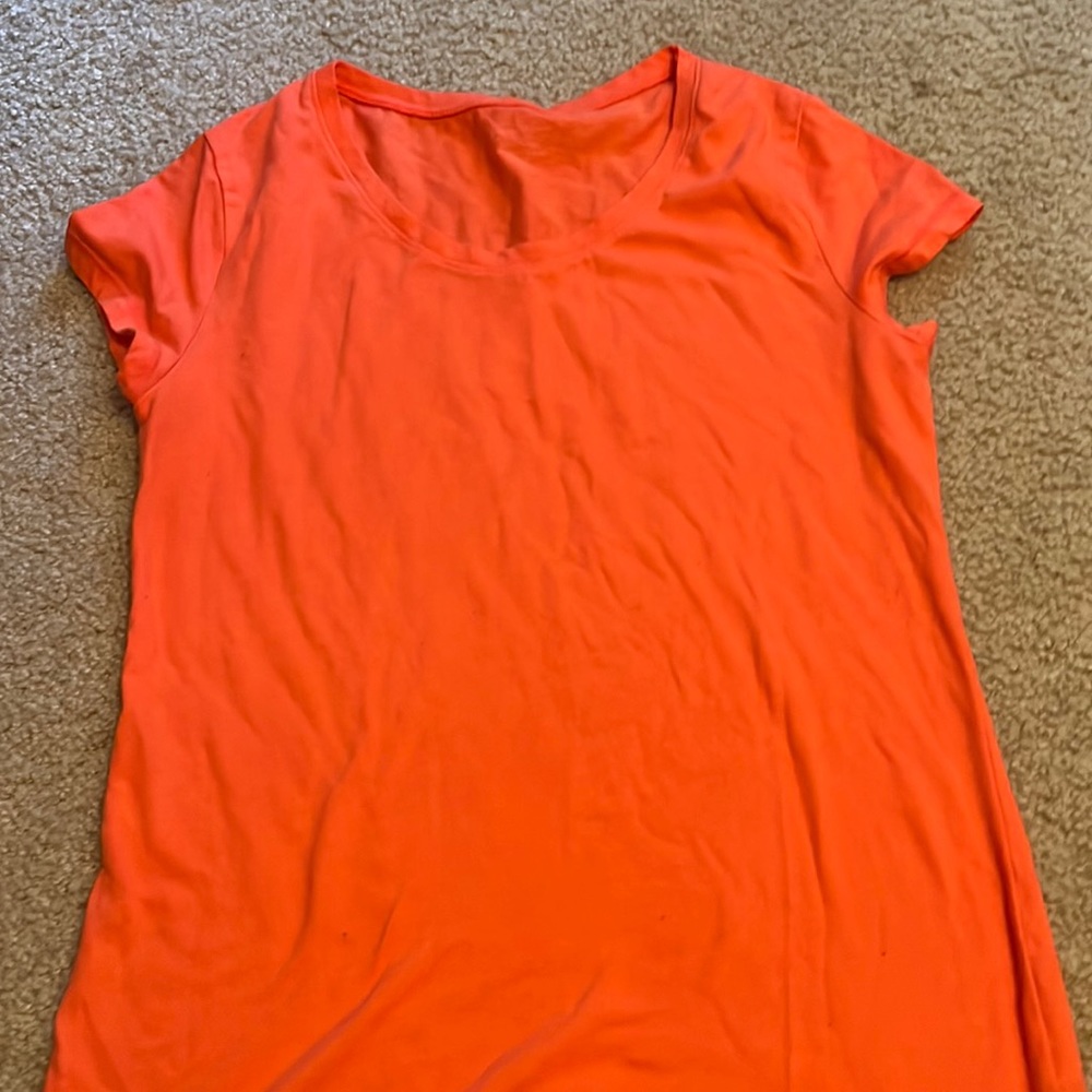 pinkish orange shirt
